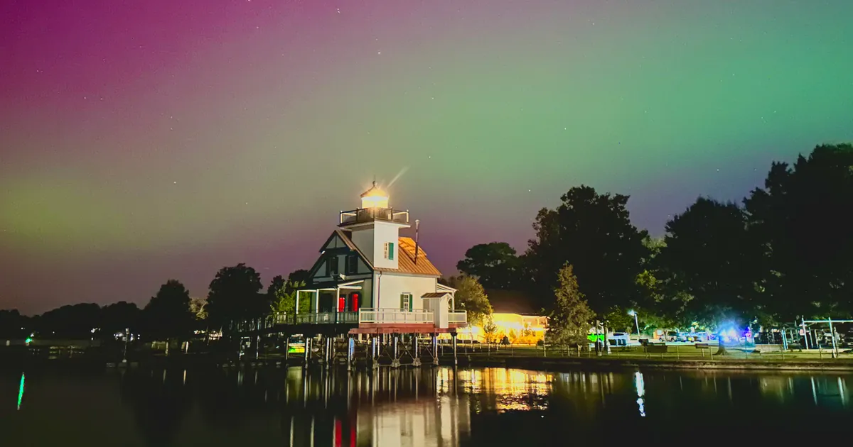 Northern lights over the Roanoke River Lighthouse and Edenton waterfront at night